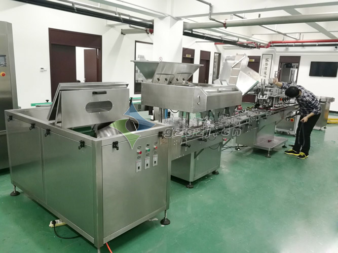 全自動瓶裝鈣片數(shù)粒灌裝封口貼標生產(chǎn)線